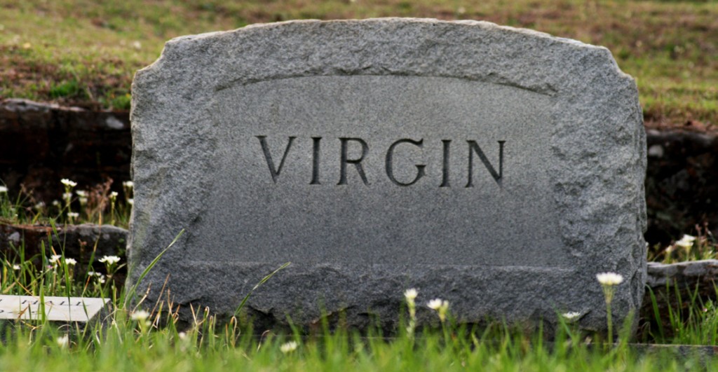Tombstone, full frame over grass reading, "Virgin"