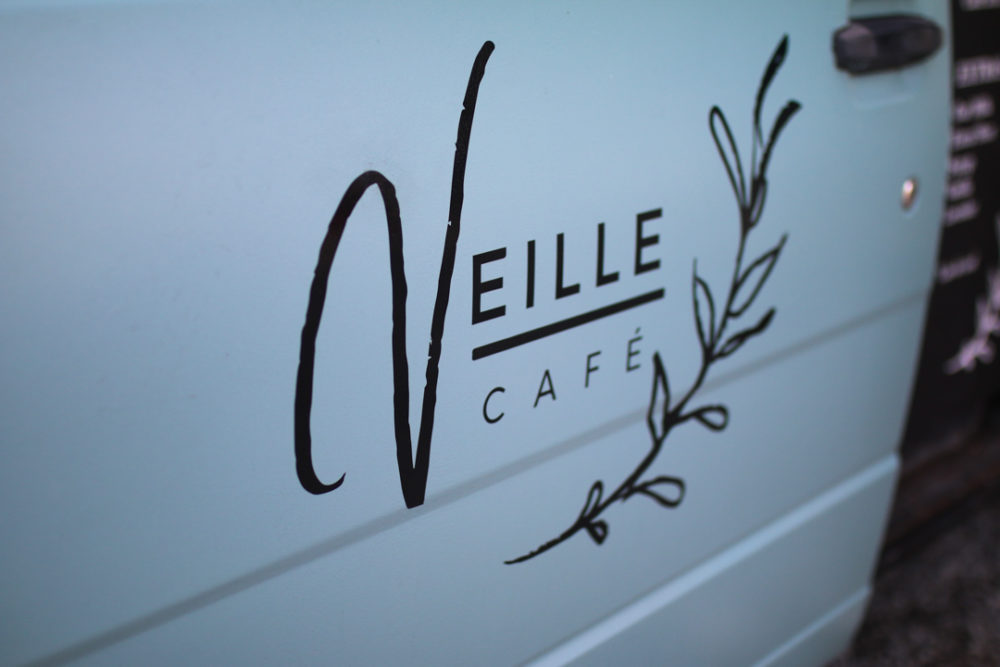 Veille Café logo on the side of its van