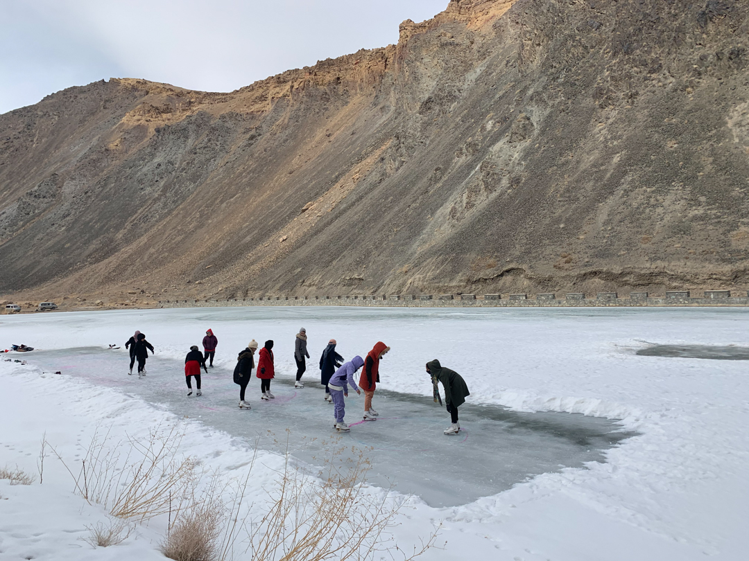 Photo of women skating on a lake in Afghanistan