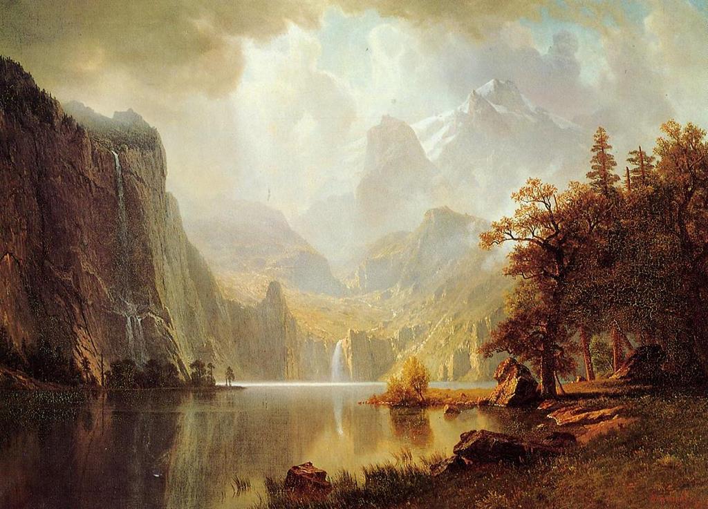 A landscape painting of a lake with the left side of the lake having a cliff and the right side having some land and a tree. further out the lake there is a waterfall. The sky is beautifully shines down on the lake giving the art a very calm ambience