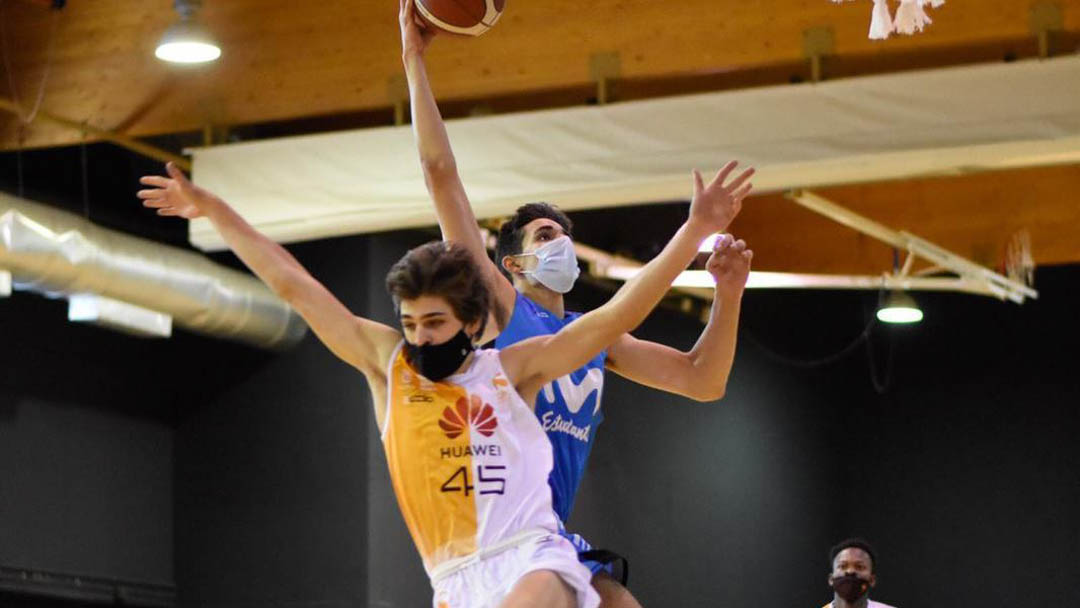 Photo of two basketball players in face masks
