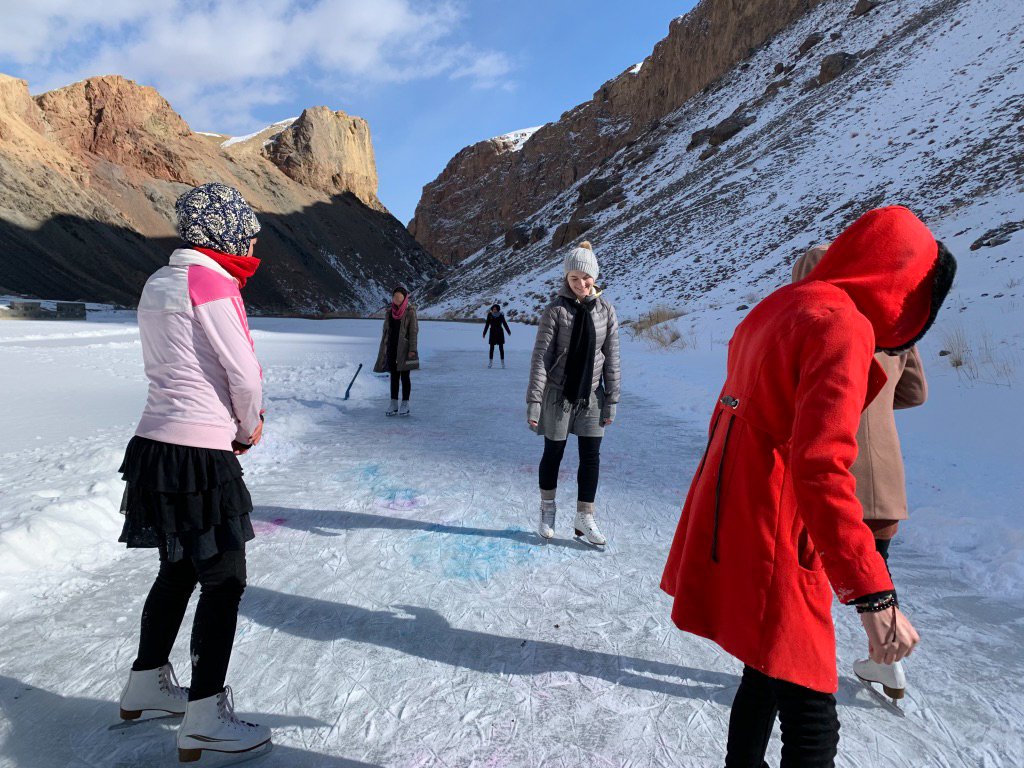 Photo of women skating on a lake in Afghanistan