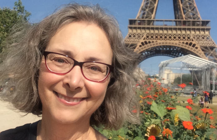 Photo of Dr. Sharon Gillies at the Eiffel Tower