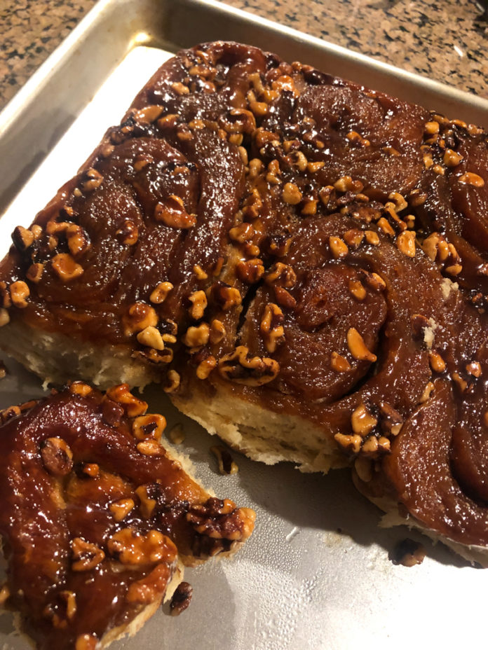 Photo of sticky banana buns with nuts on top
