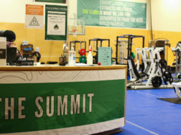 Gym equipment and front desk of The Summit