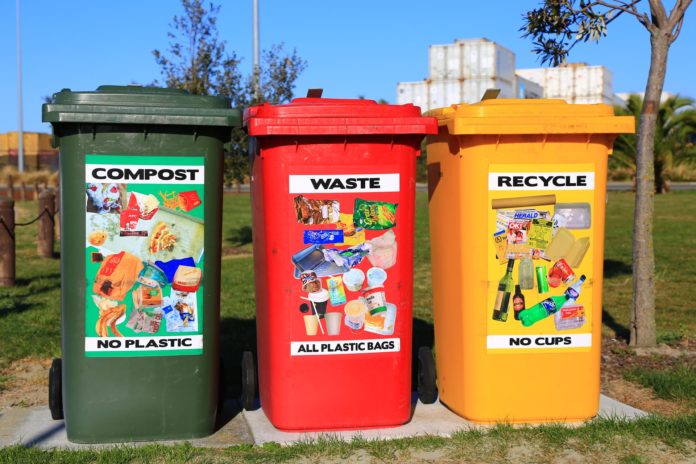 Photo of compost, waste, and recycling bins