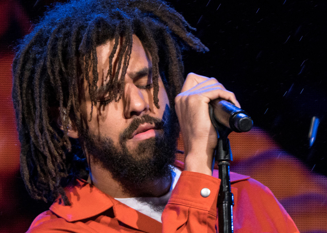 Photo of J. Cole performing