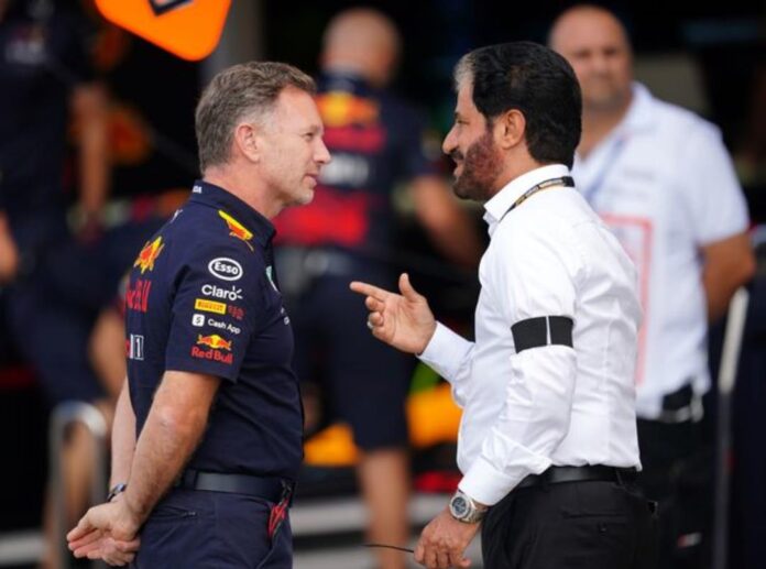 Team Principal of Red Bull, Christian Horner talking with FIA President Mohammed Ben Sulyem at the Italian Grand Prix.