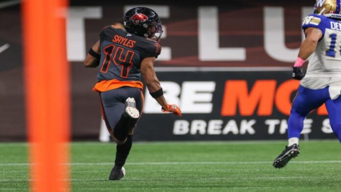 DB Marcus Sayles of the BC Lions scoring a touchdown against the Winnipeg Blue Bombers off an interception