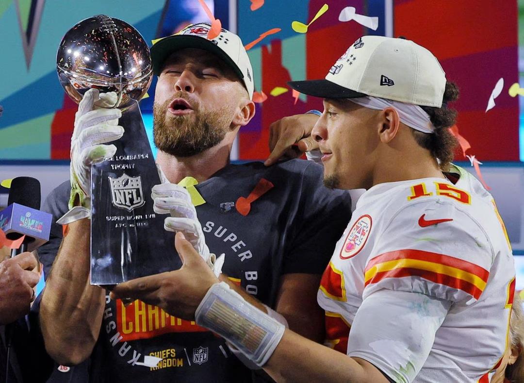 Patrick Mahones and Travis Kelce hoist the Vince Lombardi Trophy after winning Super Bowl LVII