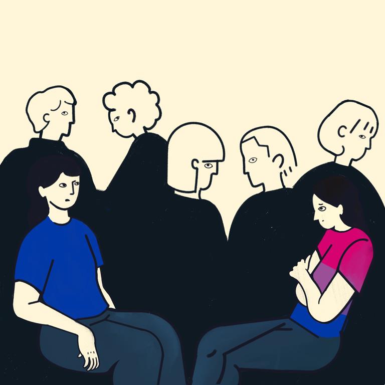 An illustration of a girl wearing a bisexual flag tshirt and she is sitting across from a female friend. She is looking uneasy as a crowd of people behind her are looking like they are judging her.