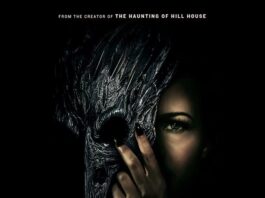 A women in a black background holding a birdmask against her face with the title of the movie at the bottom of the poster