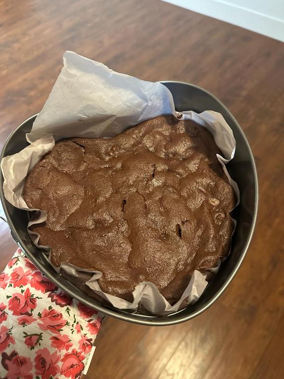 A photo of a heart shaped chocolate brownie