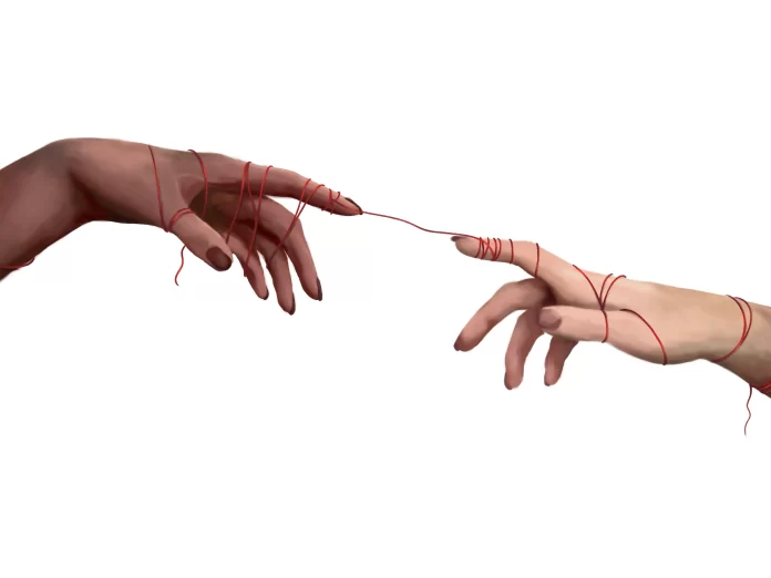 Hands reaching out for each-other connected by red string
